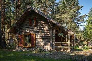 Фото номера Дом для отпуска с 2 спальнями и сауной Комплексы для отдыха с коттеджами/бунгало Sklandas г. Бернати 2
